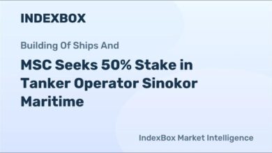 A large tanker ship sailing on the ocean, representing global maritime trade.