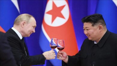 Putin and Kim Jong Un meeting, symbolizing North Korea-Russia cooperation.