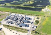 Kassø green hydrogen and e-methanol production facility with wind turbines.