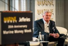 A large VLCC crude oil tanker sails at sea.