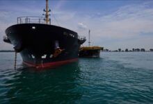 A Monjasa bunker barge operates in the port of Singapore.