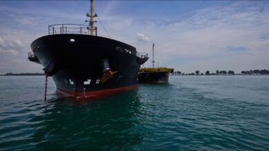 A Monjasa bunker barge operates in the port of Singapore.