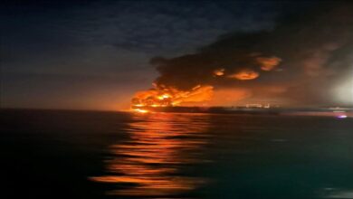 A Russian oil tanker shows damage and smoke after a drone strike near the Bosphorus Strait.