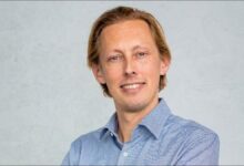 Large gas carrier ship sailing at sea, representing e-methane transport for sustainable maritime shipping.