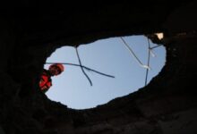 A naval vessel patrols the Strait of Hormuz during heightened Iran tensions.