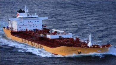 A Stolt-Nielsen chemical tanker vessel sailing on the ocean.