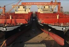 Newbuild MSC colossal containerships docked at a shipyard in China.