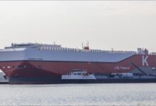K Line's Oceanus Highway, an LNG-fuelled car carrier, signifying bio-LNG supply.