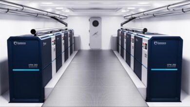 A large container ship named Helenus sails on calm blue waters, symbolizing maritime shipping.