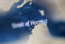 A supertanker, the 'AL MANAMAH', sails through waters near the Strait of Hormuz.