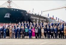 A large LR2 tanker, possibly the Frontier Venture, sails on the open sea.