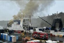 The Kodiak Enterprise fishing vessel burning, engulfed in smoke and flames.