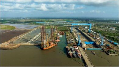A large bulk carrier ship at sea, representing new ammonia-fuelled maritime technology.