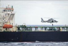 French troops board a tanker during a maritime security enforcement operation.