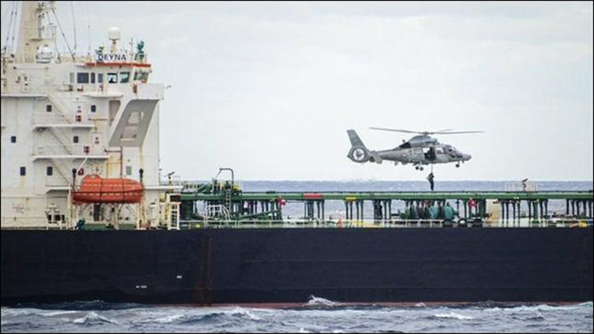 French troops board a tanker during a maritime security enforcement operation.