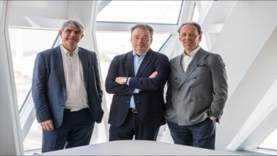 Container ships and cranes at the busy Port of Antwerp-Bruges.
