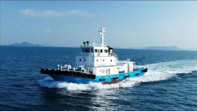 Japan's world-first hydrogen and biofuel tugboat navigating the ocean.