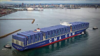 The massive CMA CGM Benjamin Franklin container ship sailing on the ocean.