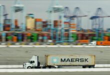 A Maersk container ship navigating waters, central to Gulf region logistics.