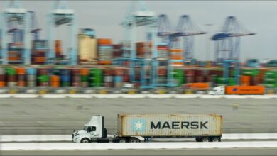A Maersk container ship navigating waters, central to Gulf region logistics.