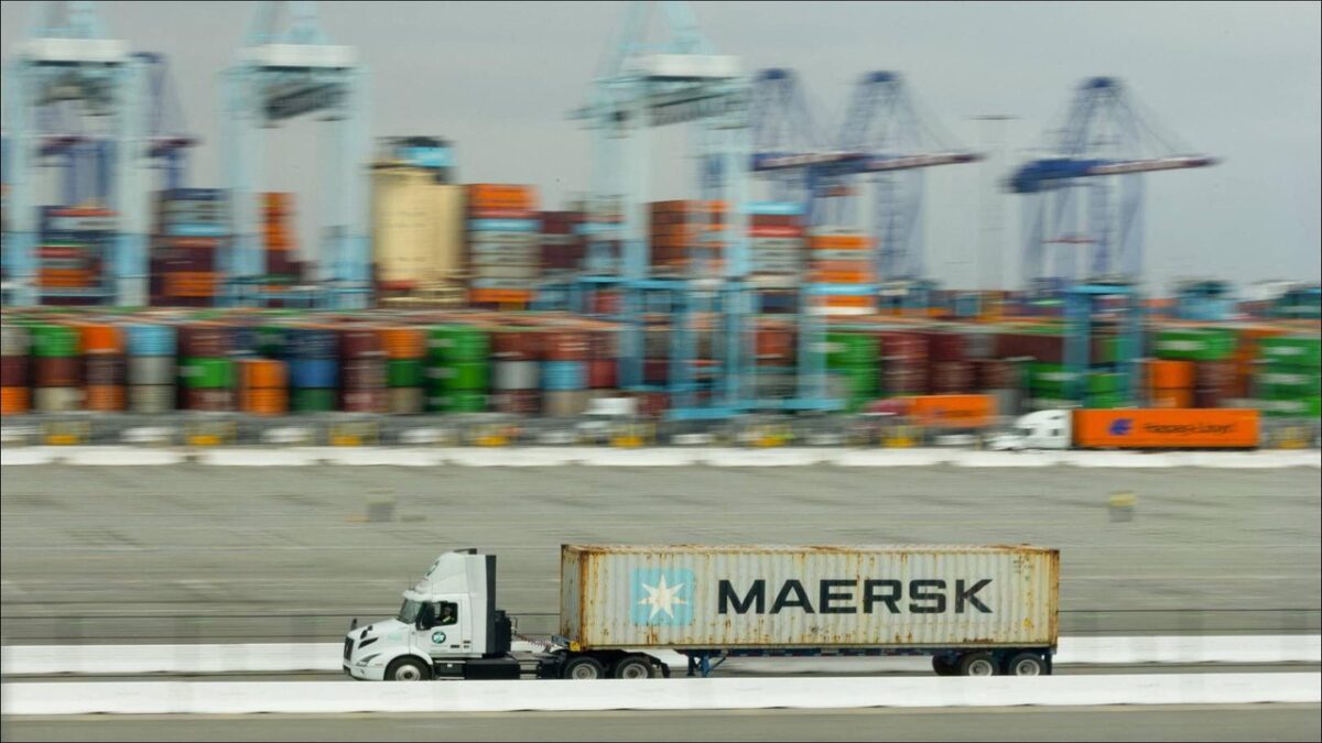 A Maersk container ship navigating waters, central to Gulf region logistics.