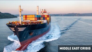 A large container ship loaded with cargo, vital for global supply chains.