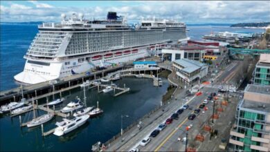 NCL Bliss cruise ship docked at the Port of Seattle, relevant to the NCLH agreement.