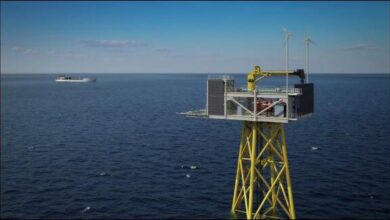 The Trudvang unmanned wellhead platform on a carrier vessel in the North Sea.