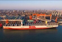 OOCL Wisdom, a large methanol-fuelled container ship, sails at sea.