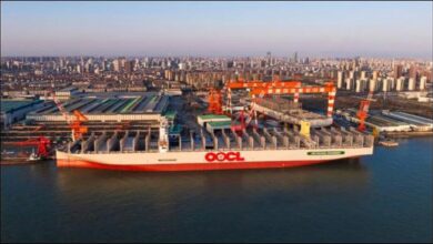 OOCL Wisdom, a large methanol-fuelled container ship, sails at sea.