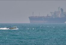 An oil tanker navigates the strategic Strait of Hormuz waterway.