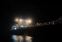 Iranian forces seizing the oil tanker Ocean Koi at sea.