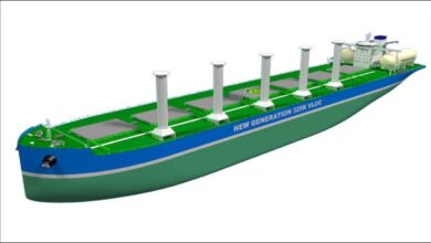 An ethanol-fueled bulk carrier ship sailing on the open ocean.