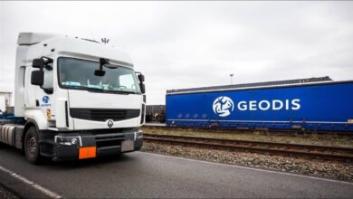 Geodis logistics terminal with freight containers and trucks in Le Havre.