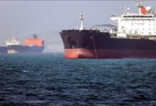 An Iranian supertanker carrying crude oil sails on the open sea.