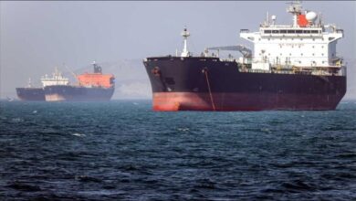 An Iranian supertanker carrying crude oil sails on the open sea.