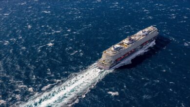 The new LNG-fueled cruise ship Mein Schiff Flow sails on the open sea.