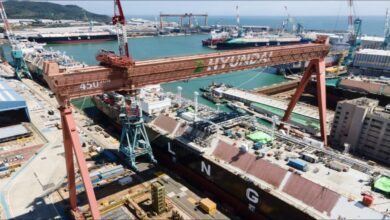 A sleek, modern hybrid-electric LNG carrier vessel design on the ocean.