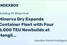 A large container ship sails on the water, representing new additions to a shipping fleet.