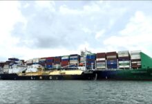 A FueLNG vessel conducts a ship-to-ship LNG bunkering operation in Singapore.