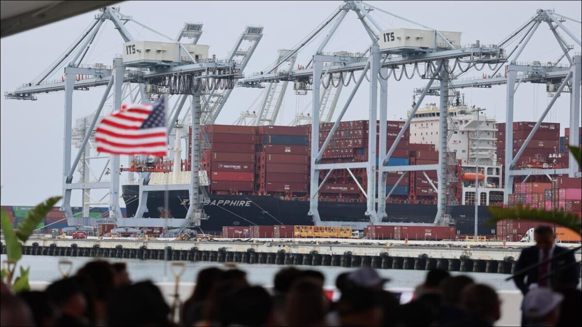Gene Seroka, Executive Director of the Port of Los Angeles, speaks at a podium.