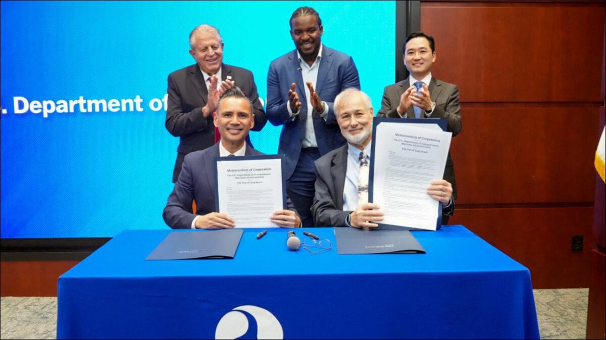Officials from MARAD and Port of Long Beach sign a nuclear shipping agreement.