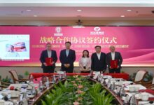 Shenzhen Port and Bureau Veritas leaders collaborating on green shipping corridor development.