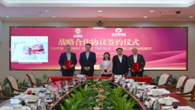 Shenzhen Port and Bureau Veritas leaders collaborating on green shipping corridor development.