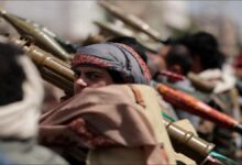 Yemen's Houthi forces on a patrol boat in the Red Sea.