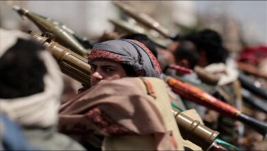 Yemen's Houthi forces on a patrol boat in the Red Sea.