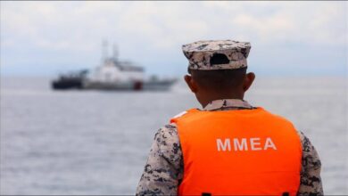 Malaysian Maritime Enforcement Agency vessel on patrol related to unauthorized anchoring.