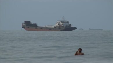 Oil tankers navigate the strategic Strait of Hormuz, crucial for global energy transport.