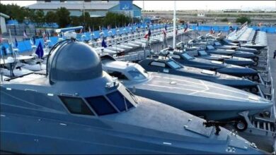 Iranian Revolutionary Guard Corps speedboats on patrol in strategic waters.