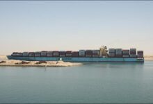 Maersk Sebarok container ship sailing through the Suez Canal.